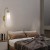 kinkiet-piega-1xe14-biala-lp-9391w-white-light-prestige-2.jpg