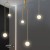 pol_po_Lampa-wiszaca-LOOP-zlota-123-cm-617_5.jpg